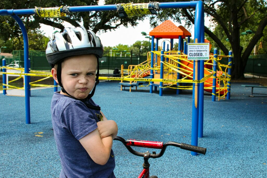 Angry boy on bike